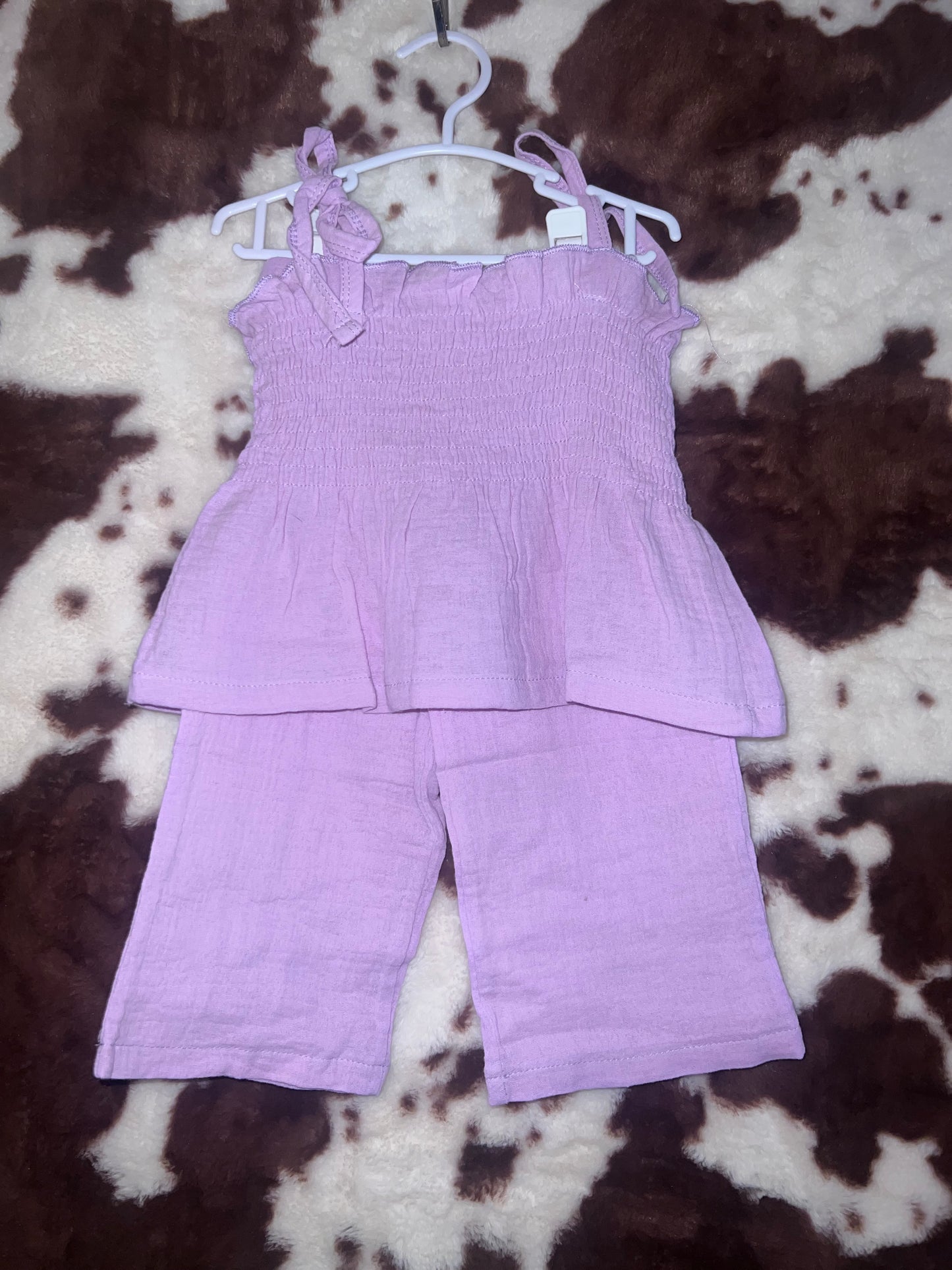 Sleeveless top and long pants