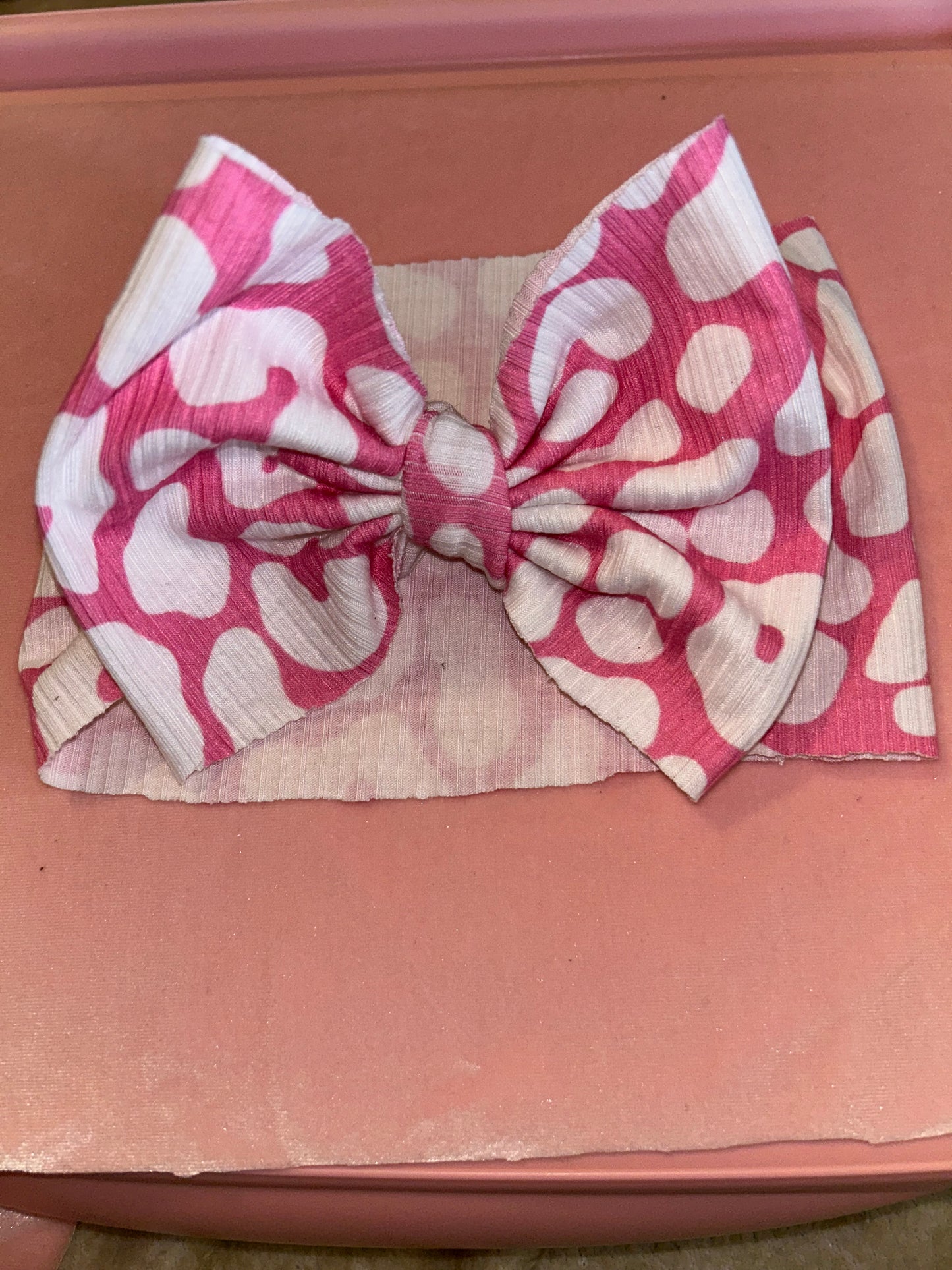 Pink leopard bows
